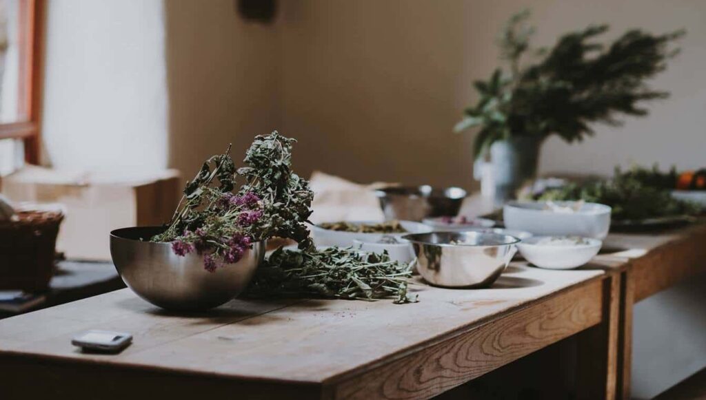 Kitchen table with herbs