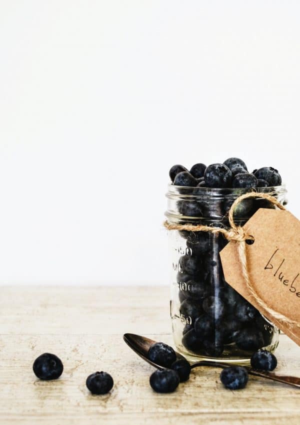 blueberries in glass mason jar