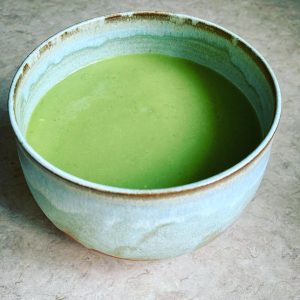 Matcha beverage in ceramic bowl