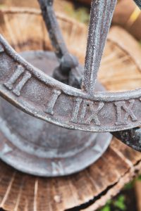 Sundial made of stone and wood with Roman numerals, to describe circadian rhythms.